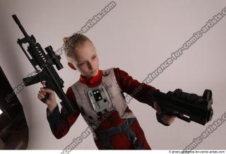 DENISA WITH TWO GUNS